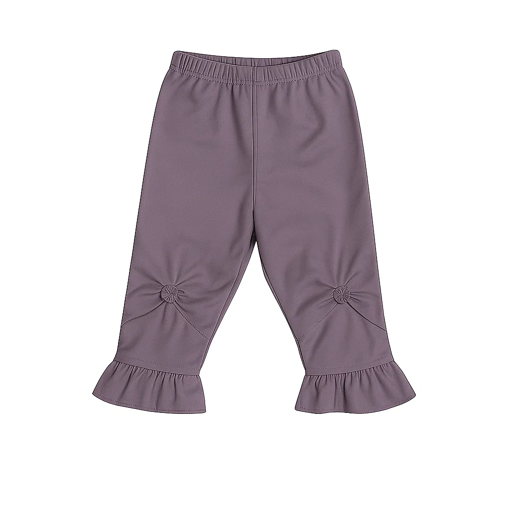 buttoned purple jacket-style top with a trouser